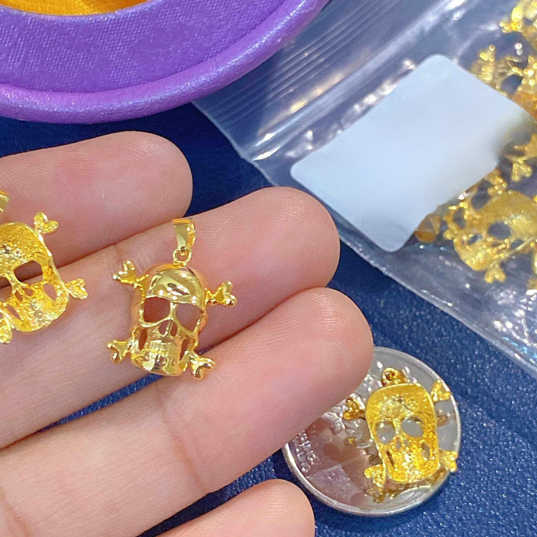 AMPAW/HOLLOW 18k Saudi Gold Skull Pendant