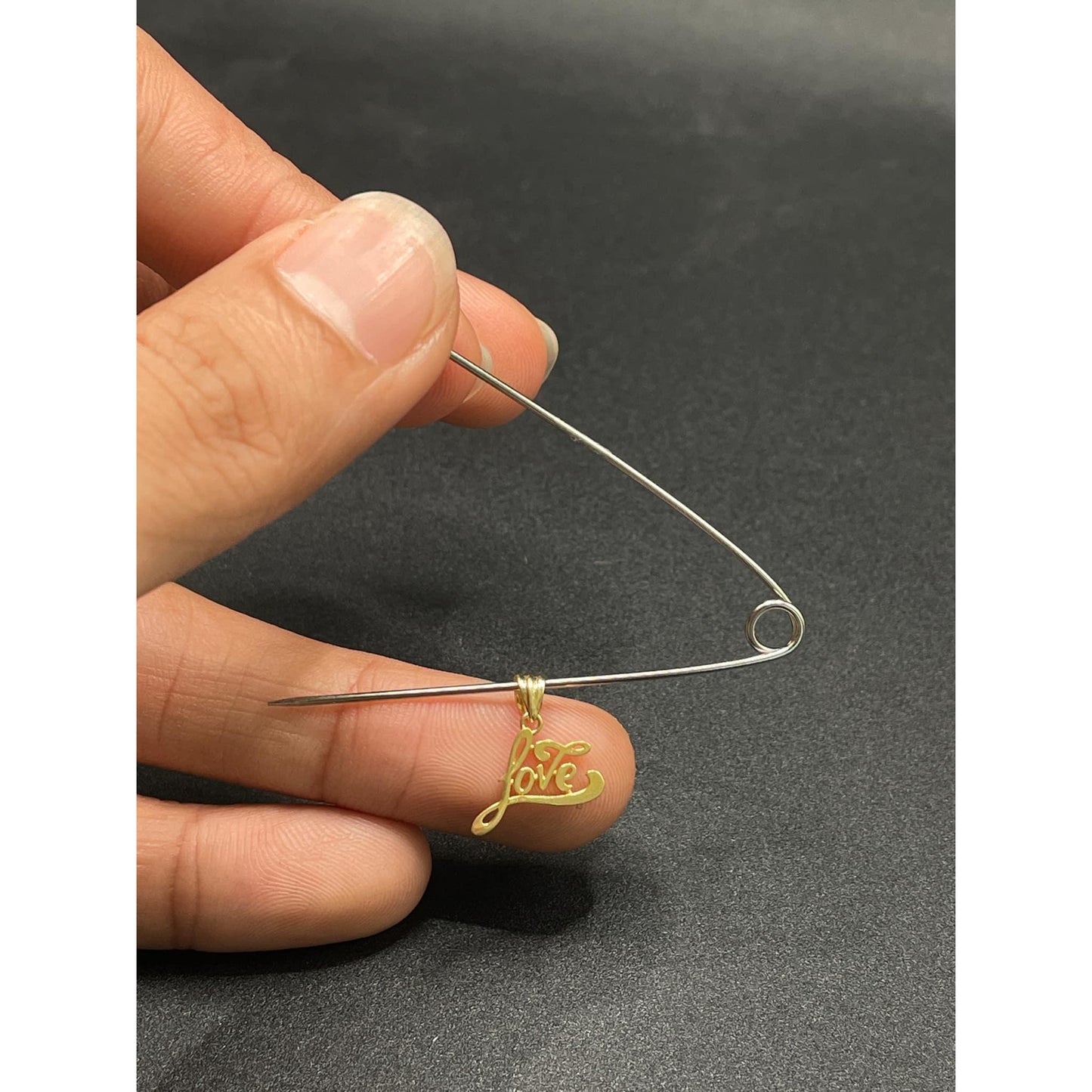 18k Saudi Gold  .42 g PER GRAM Love Pendant Solido Pawnable