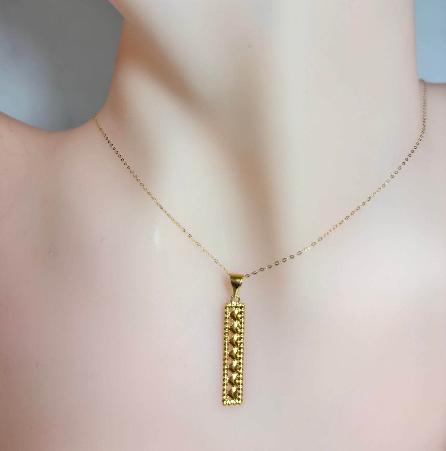 18k Saudi Gold Toblerone Pendant .21 grams - SKU-C5IKD9AJ