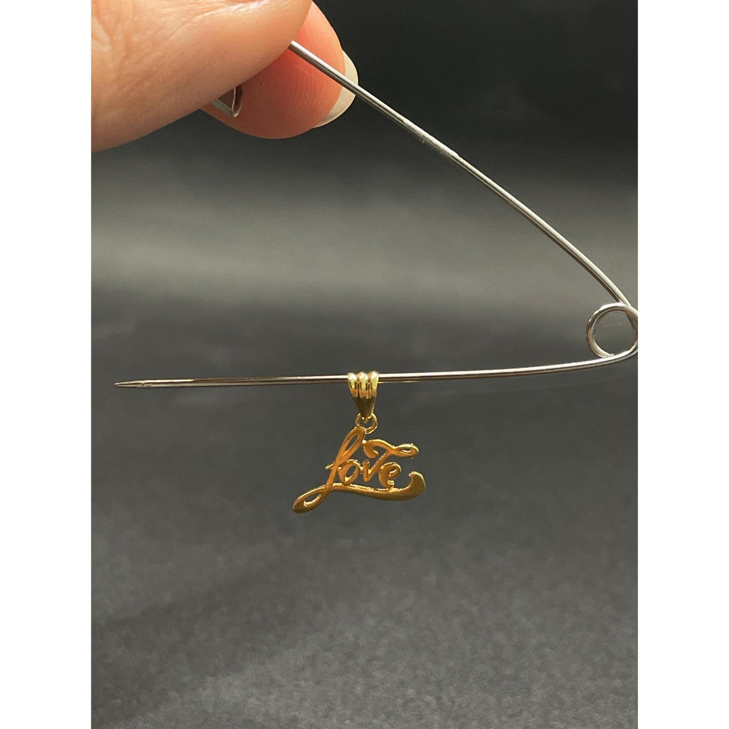 18k Saudi Gold  .42 g PER GRAM Love Pendant Solido Pawnable